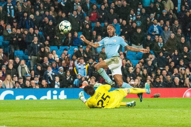 Manchester City v Feyenoord Rotterdam UEFA Champions League Raheem Sterling of Manchester City places the ball past Feyenoord Rotterdam goalkeeper Brad Jones to score his sides winning goal during the UEFA Champions League match at the Etihad Stadium, Manchester Content Not Available For UK Newspapers Copyright: xMattxWilkinsonx FIL-10984-0041