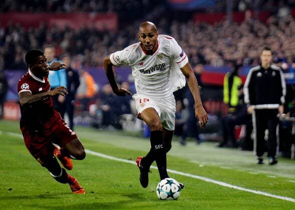21st November 2017, Ramon Sanchez Pizjuan, Seville, Spain; UEFA Champions League, Seville versus Liverpool; Wijnaldum chases the flying Nzonzi  ActionPlus11954490