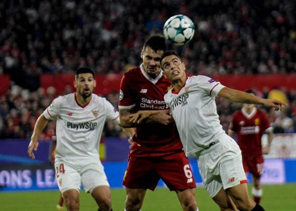 21st November 2017, Ramon Sanchez Pizjuan, Seville, Spain; UEFA Champions League, Seville versus Liverpool; Lovren (Liverpool FC) and Ben Yedder (Sevilla) challenge for a header  ActionPlus11954510