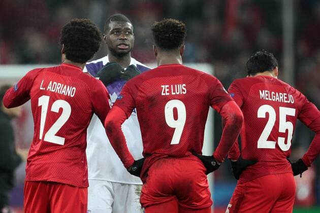 MOSCOW, RUSSIA â€“ NOVEMBER 21, 2017: Maribor s Jean Claude Billong (back) and Spartak Moscow s Luiz Adriano (12), Ze Luis (9), and Lorenzo Melgarejo(25) after the 2017 UEFA Champions League Group E football match between Spartak Moscow and Maribor at Spartak Stadium (Otkrytiye Arena); the match ended in a 1-1 draw. Sergei Bobylev TASS  TS06A087
