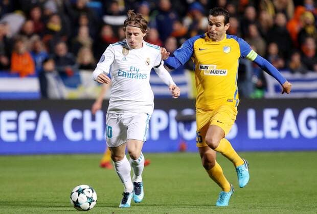 (171122) -- NICOSIA, Nov. 22, 2017 -- Real Madrid s Luka Modric (L) breaks through during the the UEFA Champions League Group H match against Apoel in Nicosia, Cyprus, Nov. 21, 2017. Real Madrid won 6-0. ) (SP)CYPRIS-NICOSIA-SOCCER-UEFA CHAMPIONS LEAGUE-REAL MADRID VS APOEL SakisxSavvides 