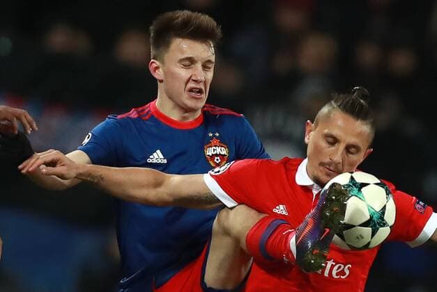 MOSCOW, RUSSIA â€“ NOVEMBER 22, 2017: CSKA Moscow s Alexander Golovin (L) and Benfica Lisbonâ€™s Ljubomir Fejsa in their 2017 18 UEFA Champions League Group A Round 5 football match at VEB Arena. Sergei Fadeichev TASS  TS06A2E3