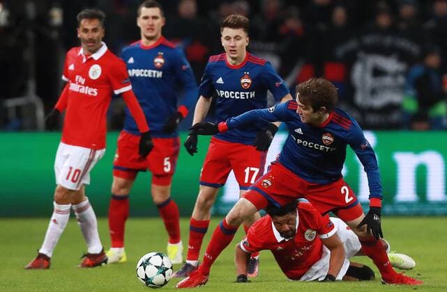 MOSCOW, RUSSIA â€“ NOVEMBER 22, 2017: CSKA Moscow s Mario Fernandes (R front), Alexander Golovin (L middle), and Benfica Lisbonâ€™s Eliseu in their 2017 18 UEFA Champions League Group A Round 5 football match at VEB Arena. Sergei Fadeichev TASS  TS06A2F1