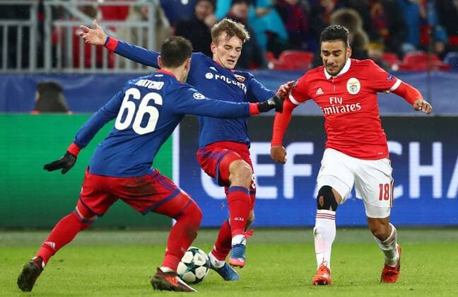 MOSCOW, RUSSIA â€“ NOVEMBER 22, 2017: CSKA Moscow s Bibras Natkho, Konstantin Kuchayev, and Benfica Lisbonâ€™s Eduardo Salvio (L-R) in their 2017 18 UEFA Champions League Group A Round 5 football match at VEB Arena; CSKA won 2-0. Stanislav Krasilnikov TASS  TS06A321