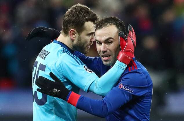MOSCOW, RUSSIA â€“ NOVEMBER 22, 2017: CSKA Moscow goalkeeper Igor Akinfeev (L) and his teammate Bibras Natkho celebrate winning their 2017 18 UEFA Champions League Group A Round 5 football match against Benfica Lisbon at VEB Arena with a 2-0 score. Stanislav Krasilnikov TASS  TS06A323