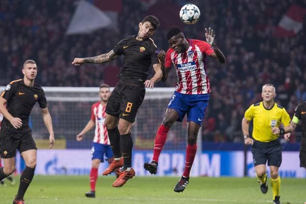 Atletico de Madrid Thomas Teye and Roma Diego Perotti during UEFA Champions League match between Atletico de Madrid and Roma at Wanda Metropolitano in Madrid, Spain. November 22, 2017.  (20171122012)