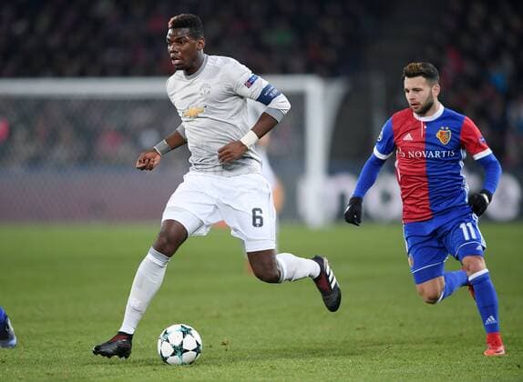 FOOTBALL CHAMPIONS LEAGUE SEASON 2017 2018 GROUP BASE FC Basel Manchester United FC 22 11 2017 Paul Pogba Manchester United FC on the ball against Renato Steffen re FC Basel Basel