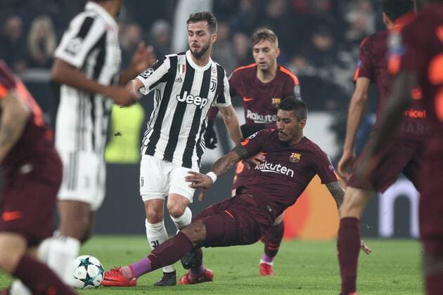 November 22, 2017 - Turin, Italy - Barcelona midfielder Paulinho (15) tackles Juventus midfielder Miralem Pjanic (5) during the Uefa Champions League group stage football match n.5 JUVENTUS - BARCELONA on 22 11 2017 at the Allianz Stadium in Turin, Italy. Juventus v FC Barcelona Barca - UEFA Champions League  - ZUMAn230 20171122_zaa_n230_301 Copyright: xMatteoxBottanellix