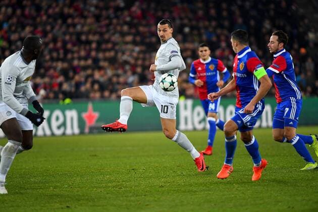 22nd November 2017, St Jakob-Park, Basel, Switzerland; UEFA Champions League, FC Basel versus Manchester United ManU Zlatan Ibrahimovic of Manchester United lays the ball off as he is challenged by Marek Suchy and Luca Zuffi of FC Basel  ActionPlus11954812