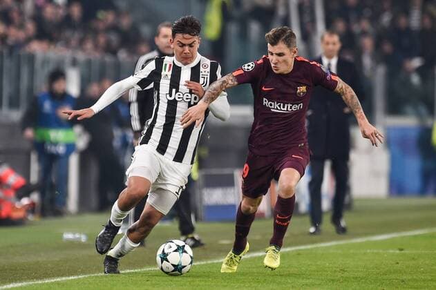 November 22, 2017 - Turin, Italy - Paulo Dybala of Juventus is challenged by Lucas Digne of Barcelona during the UEFA Champions League match between Juventus and Barcelona at the Juventus Stadium, Turin, Italy on 22 November 2017. Juventus v Barcelona - UEFA Champions League  - ZUMAn230 20171122_zaa_n230_357 Copyright: xGiuseppexMaffiax