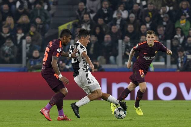 22nd November 2017, Allianz Stadium, Turin, Italy; UEFA Champions League, Juventus versus Barcelona; Paulo Dybala shields the ball from Paulinho  ActionPlus11954924