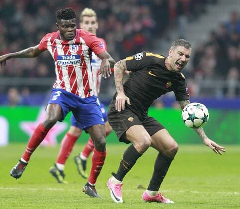 Atletico de Madrid s Thomas Partey (l) and AS Roma s Aleksandar Kolarov during Champions League 2017 2018, Group C, match 5. November 22,2017.  (2017112268)