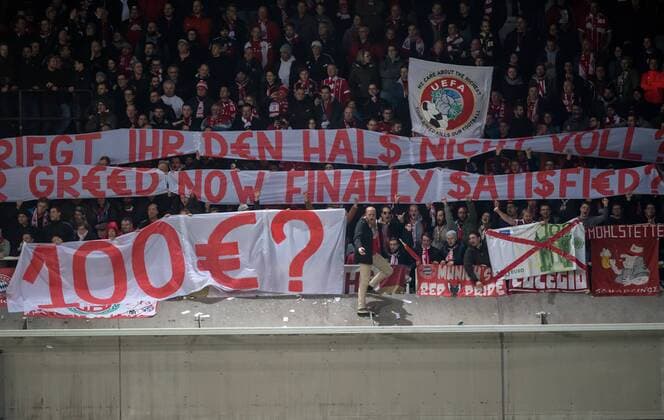 22 November 2017 Anderlecht Constant Vanden Stock Stadium Football UEFA Champions League RSC Anderlecht FC Bayern Muenchen Muenchens fans protest on banners against the high ticket prices for the game and throw banknotes on the field