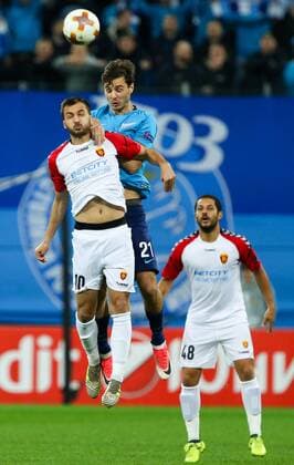 ST PETERSBURG, RUSSIA â€“ NOVEMBER 23, 2017: FK Vardar s Ytalo (R) looks on as Boban Nikolov (L) and FC Zenit St Petersburg s Alexander Yerokhin (C) jump to head the ball in their UEFA Europa League Group L Round 5 football match at Saint Petersburg Stadium. Peter Kovalev TASS  TS06A4E2