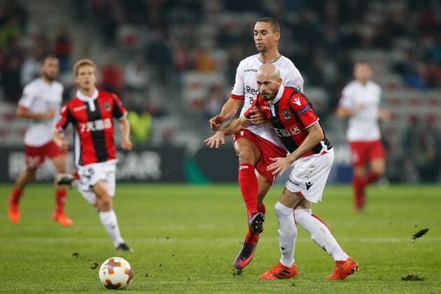 Essevee s Nill De Pauw and Nice Christophe Jallet fight for the ball during a game between French club OGC Nice and Belgian soccer team SV Zulte Waregem, the fifth game of the group stage (Group K) of the UEFA Europa League competition, Thursday 23 November 2017 in Nice, France. BRUNOxFAHY  x05207272x