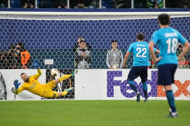 ST PETERSBURG, RUSSIA â€“ NOVEMBER 23, 2017: FK Vardar s goalkeeper Filip Gachevski and FC Zenit St Petersburg s Artyom Dzyuba, Yuri Zhirkov (L-R) in action in their UEFA Europa League Group L Round 5 football match at Saint Petersburg Stadium. Alexander Demianchuk TASS  TS06A4F1