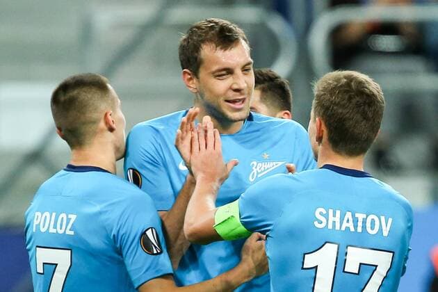 ST PETERSBURG, RUSSIA â€“ NOVEMBER 23, 2017: FC Zenit St Petersburg s Dmitry Poloz, Artyom Dzyuba, and Oleg Shatov (L-R) celebrate scoeing in their UEFA Europa League Group L Round 5 football match against FK Vardar at Saint Petersburg Stadium. Peter Kovalev TASS  TS06A4FB