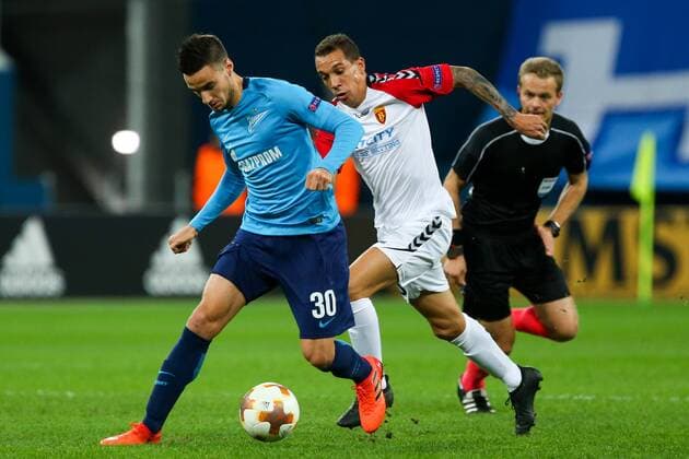 ST PETERSBURG, RUSSIA â€“ NOVEMBER 23, 2017: FC Zenit St Petersburg s Emanuel Mammana and FK Vardar s Juan Felipe (L-R) figth for the ball in their UEFA Europa League Group L Round 5 football match at Saint Petersburg Stadium. Peter Kovalev TAS  TS06A4FF