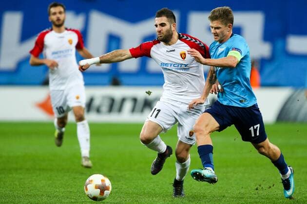ST PETERSBURG, RUSSIA â€“ NOVEMBER 23, 2017: FC Zenit St Petersburg s Oleg Shatov and FK Vardar s Tigran Barseghyan (R-L) figth for the ball in their UEFA Europa League Group L Round 5 football match at Saint Petersburg Stadium. Peter Kovalev TASS  TS06A500