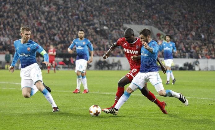 Cologne RheinEnergieStadion 23 11 17 Sehrou Guirassy 1 FC Köln M are fouled by Mathieu Debuchy Arsenal in London R and receive penalties leading to the 1 0 goal in the Europaleague match between 1 FC Köln vs Arsenal London in the 2017 season 2018