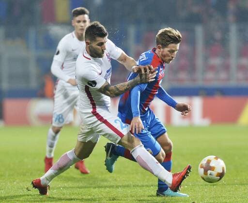 Ovidiu Popescu of FCSB, left, and Patrik Hrosovsky of Victoria in action during the 5th round, Football European League match FC Viktoria Pilsen vs FC Steaua Bucurest (FCSB) in Pilsen, Czech Republic, November 23, 2017. (CTKxPhoto MiroslavxChaloupka) CTKPhotoP201711230900501  cha08