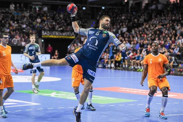 Drago Vukovic Fuechse Berlin with heavy work in defense Action Action Horizontal horizontal Event Event EHF Cup Qualification 3 Round Fuechse Berloin vs FC Porto Location Max Schmeling Halle Berlin Germany Germany Europe Europe Date Date 23 11 2017 Handball EHF Cup Fuechse Berlin vs FC Porto 23 11 2017