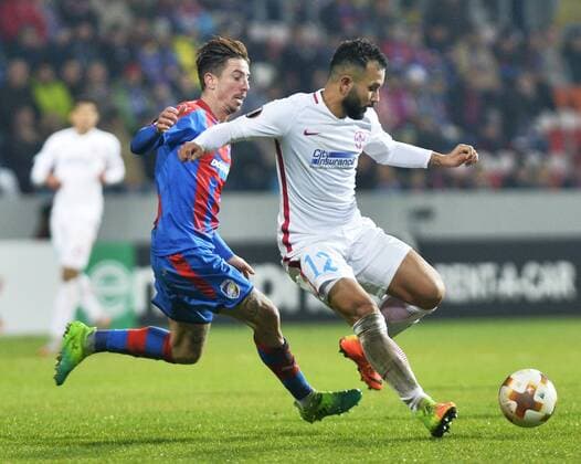 Milan Petrzela of Victoria, left, and Junior Morais of FCSB in action during the 5th round, Football European League match FC Viktoria Pilsen vs FC Steaua Bucurest (FCSB) in Pilsen, Czech Republic, November 23, 2017. (CTKxPhoto MiroslavxChaloupka) CTKPhotoP201711230912401  cha011