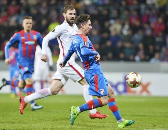 Mihai Balasa of FCSB, left, and Milan Petrzela of Victoria in action during the 5th round, Football European League match FC Viktoria Pilsen vs FC Steaua Bucurest (FCSB) in Pilsen, Czech Republic, November 23, 2017. (CTKxPhoto MiroslavxChaloupka) CTKPhotoP201711230915901  cha012