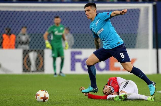 ST PETERSBURG, RUSSIA â€“ NOVEMBER 23, 2017: FC Zenit St Petersburg s Matias Kranevitter (L) and FK Vardar s Boban Nikolov in action in their 2017-18 UEFA Europa League Group L Round 5 football match at Saint Petersburg Stadium. FC Zenit St Petersburg won the game 2-1. Alexander Demianchuk TASS  TS06A527