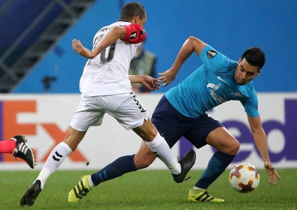 ST PETERSBURG, RUSSIA â€“ NOVEMBER 23, 2017: FK Vardar s Juan Felipe (L) and FC Zenit St Petersburg s Christian Noboa fight for the ball in their 2017-18 UEFA Europa League Group L Round 5 football match at Saint Petersburg Stadium. FC Zenit St Petersburg won the game 2-1. Alexander Demianchuk TASS  TS06A52D