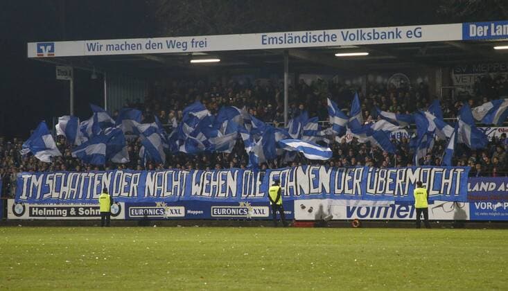 24 11 2017 Hänsch Arena Meppen GER Soccer 3 Liga SV Meppen vs SG Sonnenhof Großaspach SVM Choreography in the shadow of the night, the flags of the overwhelming power of Meppen Niedersachsen Germany Hänsch Arena are blowing