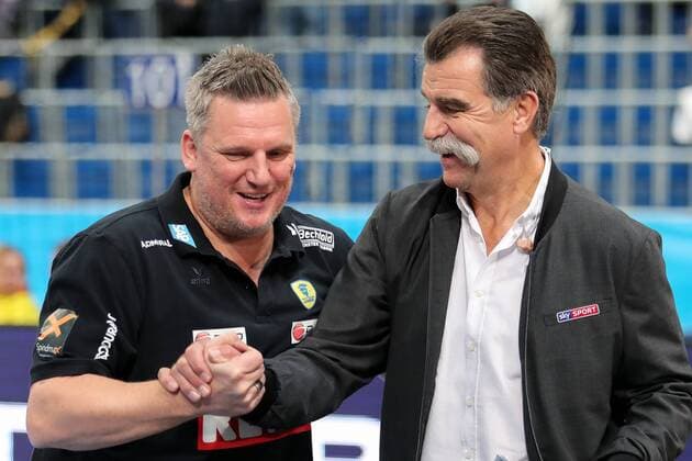 v left Nikolaj Jacobsen coach head coach RNL and Heiner Brand TV expert for sky greet before the game welcome joy friendly cheerful bright optimistic handball Champions League Rhein Neckar Löwen HC Vardar Skopje xozx