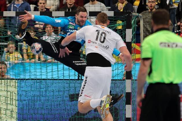v left Andreas Palicka Goalkeeper RNL 12 Dainis Kristopans Skopje 10 Action Action Game scene Handball Champions League Rhein Neckar Löwen HC Vardar Skopje xozx