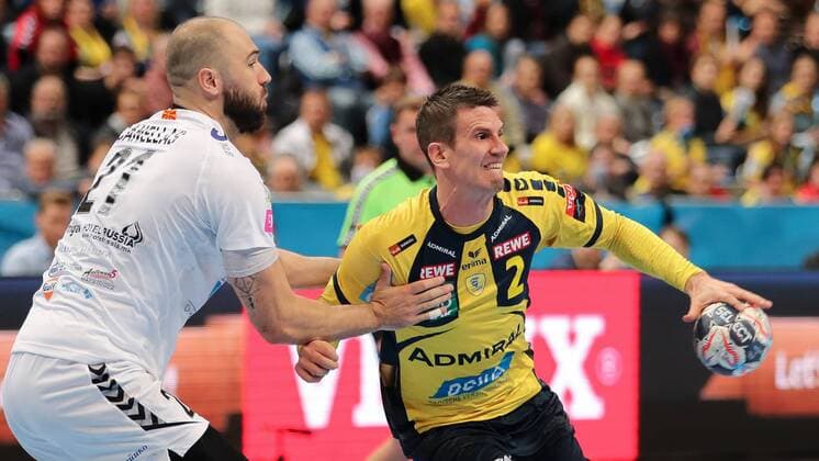 Joan Canellas Reixach Skopje 21 Andre Schmid Andy Schmid RNL 2 Duel duel tackle tackling Dynamics Action Action Handball Champions League Rhein Neckar Löwen HC Vardar Skopje xozx