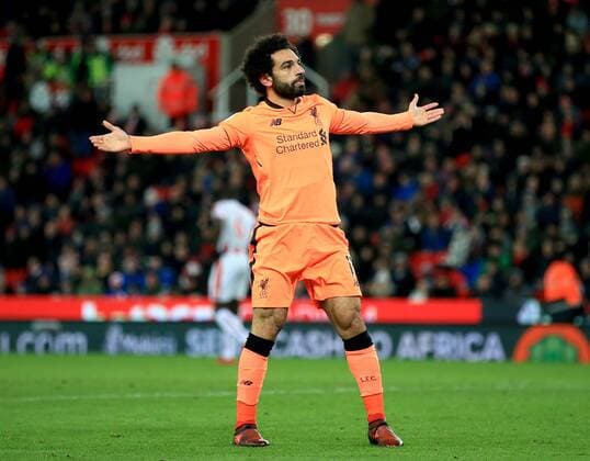 Mohamed Salah of Liverpool celebrates after he scores his sides second goal during the premier league match at the bet365 Stadium, Stoke on Trent. Picture date 29th November 2017. Picture credit should read: Clint Hughes Sportimage EDITORIAL USE ONLY. No use with unauthorised audio, video, data, fixture lists, club league logos or live services. Online in-match use limited to 120 images, no video emulation. No use in betting, games or single club league player publications.