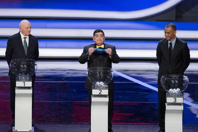 (171201) -- MOSCOW, Dec. 1, 2017 -- Argentinian soccer legend Diego Maradona (C) shows Croatia during the Final Draw of the FIFA World Cup WM Weltmeisterschaft Fussball 2018 at the Kremlin Palace in Moscow, capital of Russia, Dec. 1, 2017. ) (SP)RUSSIA-MOSCOW-SOCCER-2018 FIFA WORLD CUP FINAL-DRAW BaixXueqi 