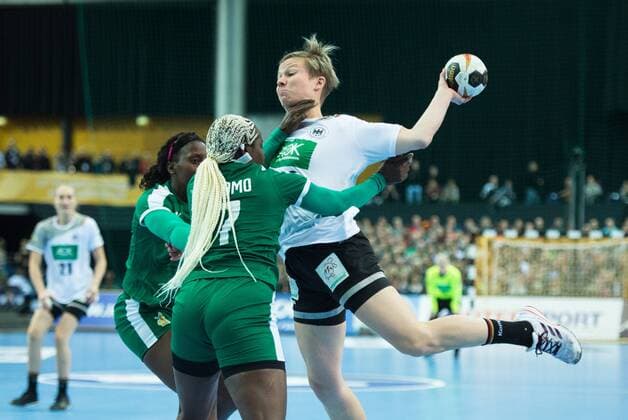 left Anne Michelle Essam 15 CMR Vanessa Djiepmou Medibe 7 CMR Friederike Gubernatis 42 GER Preliminary Group Play Germany Cameroon in Leipzig on 01 12 2017 Handball 23 Women Handball World Cup in Germany 2017