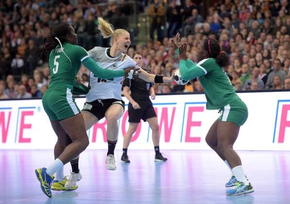 Yvette Yuoh CMR 5 v Kim Naidzinavicius GER 15 at Game Germany GER vs Cameroon CMR Handball Women World Cup Leipzig 01 12 2017 Leipzig Copyright: xModlax Eibner-Pressefotox EP_cma