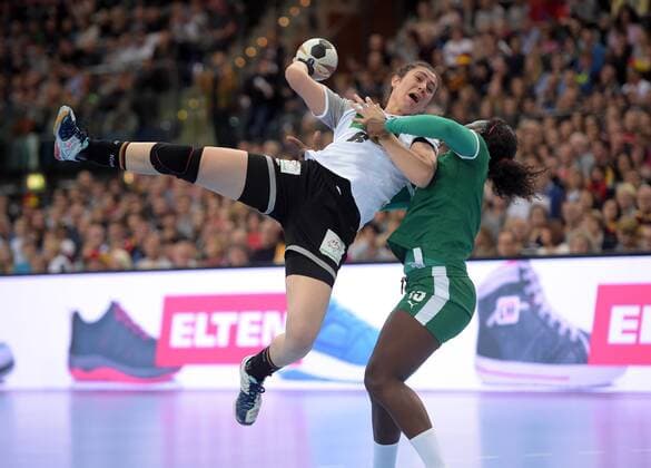 Jenny Karolius GER 6 against Anne Michelle Essam CMR 15 at the match Germany GER vs Cameroon CMR Handball Women World Cup Leipzig 01 12 2017 Leipzig Copyright: xModlax Eibner-Pressefotox EP_cma