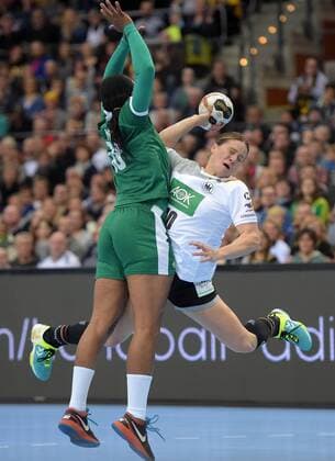 Anna Loerper GER 10 against Aubiege Njampou Nono CMR 18 at the match Germany GER vs Cameroon CMR Handball Women World Cup Leipzig 01 12 2017 Leipzig Copyright: xModlax Eibner-Pressefotox EP_cma