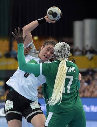 Jenny Karolius GER 6 vs Jacky Baniomo CMR 17 at Game Germany GER vs Cameroon CMR Handball Women World Cup Leipzig 01 12 2017 Leipzig Copyright: xModlax Eibner-Pressefotox EP_cma