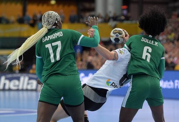Jacky Baniomo CMR 17 and Jaqueline Mossy Solle CMR 6 against Jenny Karolius GER 6 at the match Germany GER vs Cameroon CMR Handball Women World Cup Leipzig 01 12 2017 Leipzig Copyright: xModlax Eibner-Pressefotox EP_cma