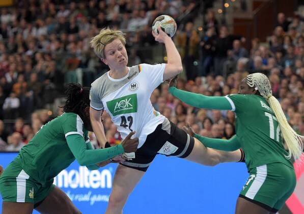 Jasmine Yotchoum CMR 14 and Jacky Baniomo CMR 17 against Friederike Gubernatis GER 42 at the match Germany GER vs Cameroon CMR Handball Women World Cup Leipzig 01 12 2017 Leipzig Copyright: xModlax Eibner-Pressefotox EP_cma