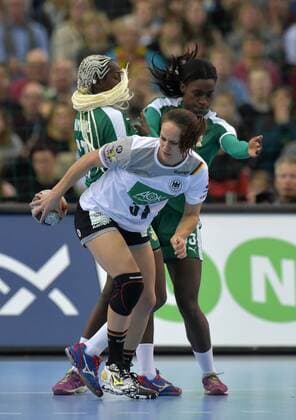 Kerstin Wohlbold GER 31 against Jacky Baniomo CMR 17 and Lisa Atangana Belibi CMR 35 at the match Germany GER vs Cameroon CMR Handball Women World Cup Leipzig 01 12 2017 Leipzig Copyright: xModlax Eibner-Pressefotox EP_cma