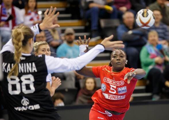 Oldenburg Niedersachsen DEU 02 12 2017 Aya Ben Abdallah right Tunisia Club Club Africain TUN and Viktoriia Kalinina left Russia Club Kuban Handball Womens World Cup Germany 2017 Preliminary Group C Russia vs Tunisia Handball World Championship of Women Germany