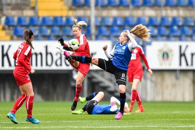 Acrobatic duel in the air Laura Liedmeier DSC Arminia Bielefeld 17 with Elise Kellond Knight Potsdam 6 Football DFB Womens Cup DSC Arminia Bielefeld 1 FFC Turbine Potsdam xmkx
