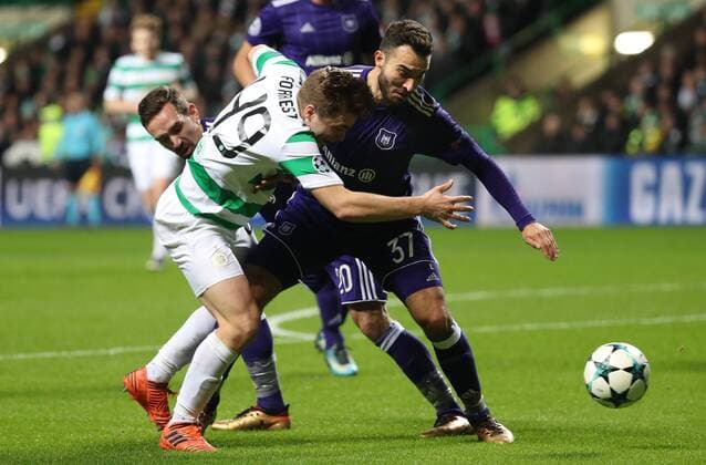 Anderlecht s Sven Kums, Celtic s James Forrest and Anderlecht s Ivan Obradovic fight for the ball during a soccer game between Scottish team Celtic FC and Belgian club RSC Anderlecht, Tuesday 05 December 2017 in Glasgow, Scotland, the sixth and last game in the group stage of the UEFA Champions League competition. VIRGINIExLEFOUR  x05214440x