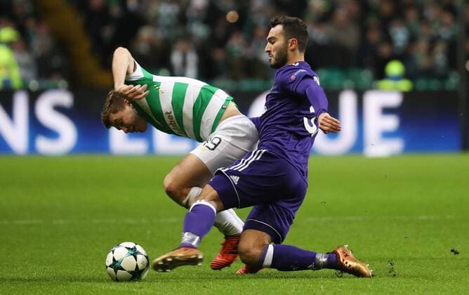 Celtic s James Forrest and Anderlecht s Ivan Obradovic fight for the ball during a soccer game between Scottish team Celtic FC and Belgian club RSC Anderlecht, Tuesday 05 December 2017 in Glasgow, Scotland, the sixth and last game in the group stage of the UEFA Champions League competition. VIRGINIExLEFOUR  x05214436x