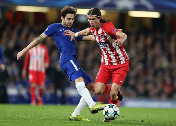 5th December 2017, Stamford Bridge, London, England; UEFA Champions League football, Chelsea versus Atletico Madrid; Cesc Fabregas of Chelsea challenges Filipe Luis of Atletico Madrid  ActionPlus11959270