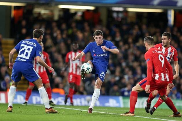 5th December 2017, Stamford Bridge, London, England; UEFA Champions League football, Chelsea versus Atletico Madrid; Andreas Christensen of Chelsea clears the ball out over Fernando Torres of Atletico Madrid and Cesar Azpilicueta of Chelsea  ActionPlus11959275